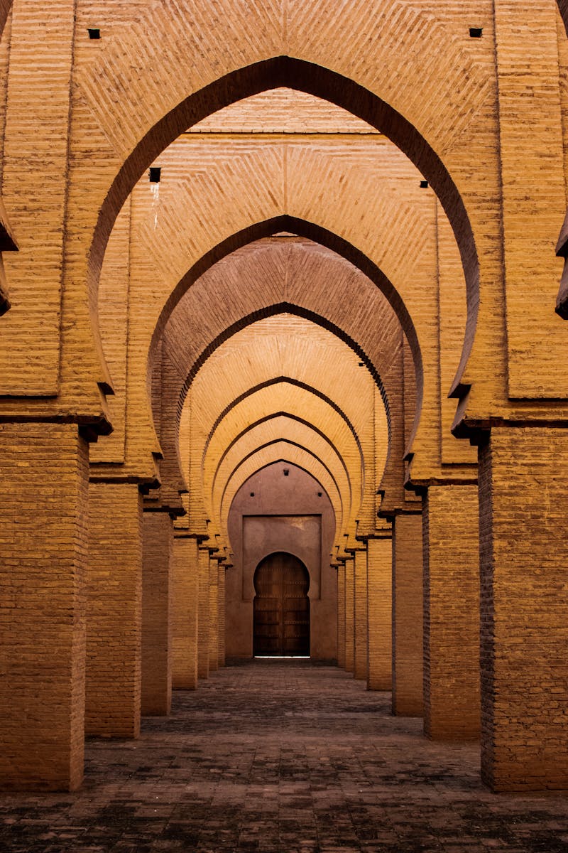 Captivating interior of Tinmel Mosque in Morocco showcasing intricate arches and architectural design.