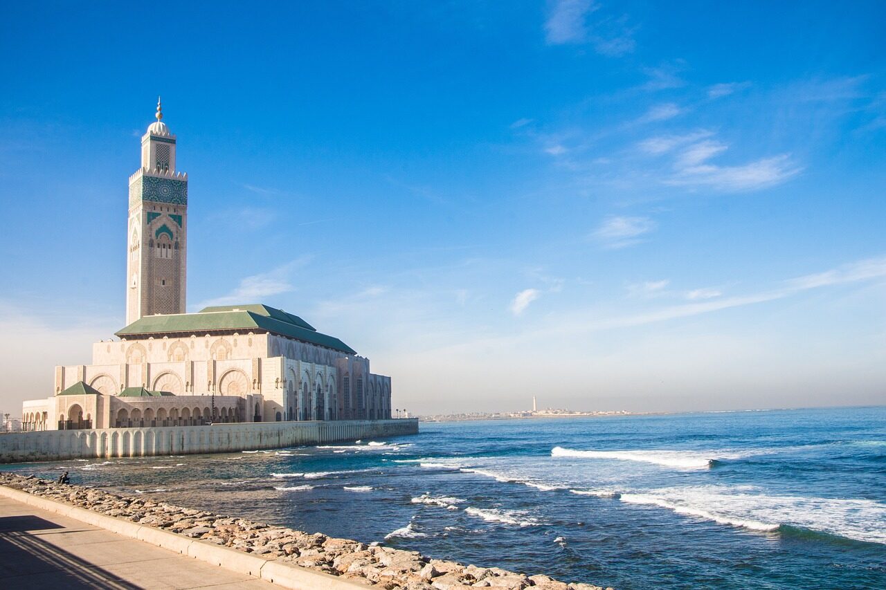 casablanca, mosque, sea, morocco, travel, architecture, islam, building, religion, landmark, muslim, hassan, arabic, africa, islamic, famous, moroccan, culture, blue sky, nature, minaret, tower, exterior, design, worship, blue, sky, religious, city, blue city, blue travel, blue building, blue design, blue mosque, blue culture