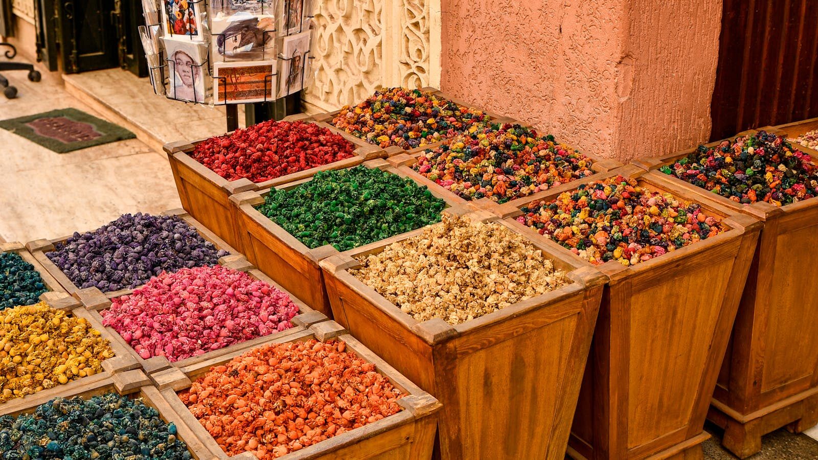 Colorful spices in a Marrakesh market showcase traditional Moroccan culture.